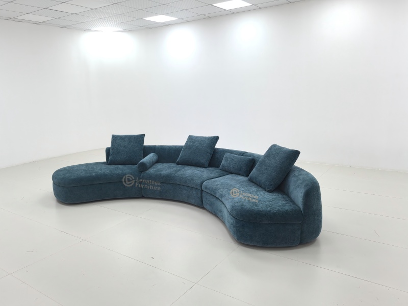 Zakrzywiona sofa tkanina | Użyj delikatnych krzywych, aby zarysować artystyczne poczucie salonu